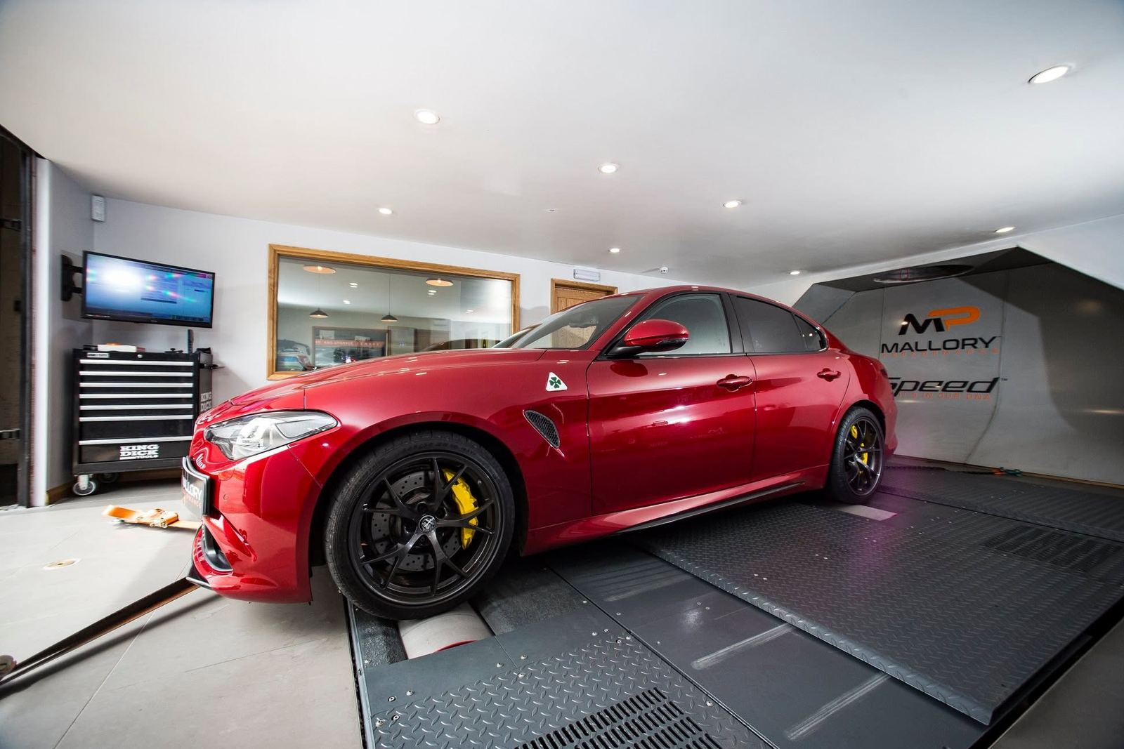 Alfa Romeo Giulia Quadrifoglio strapped to the rolling road